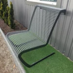 AS-3 bench side profile highlighting ergonomic recline and continuous steel-rod construction