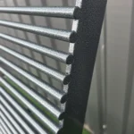 AS-3 bench side profile highlighting ergonomic recline and continuous steel-rod construction